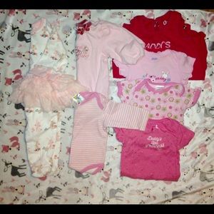 7 baby outfits, sizes ranging from 0m-6m
